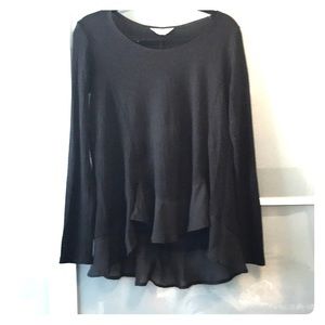 Light sweater with flowy trim